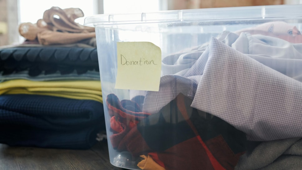 Community donations in plastic box cropped-5 cropped