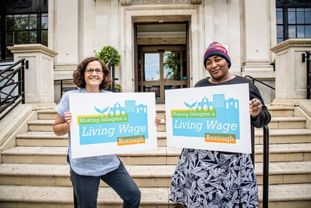 Cllr Shaikh, left, and Islington Council employee Dionne Brooks celebrate the action plan to make Islington a Living Wage Borough