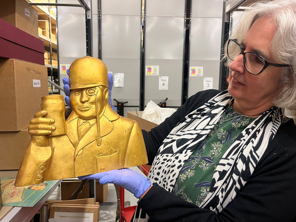 Power of Persusasion: Part of the exhibition will include a selection of vintage signs which once adorned the streets of Leeds. These include include an eye-catching golden Tetley’s brewery sign held here by Kitty Ross, curator of social history with Leeds Museums and Galleries.