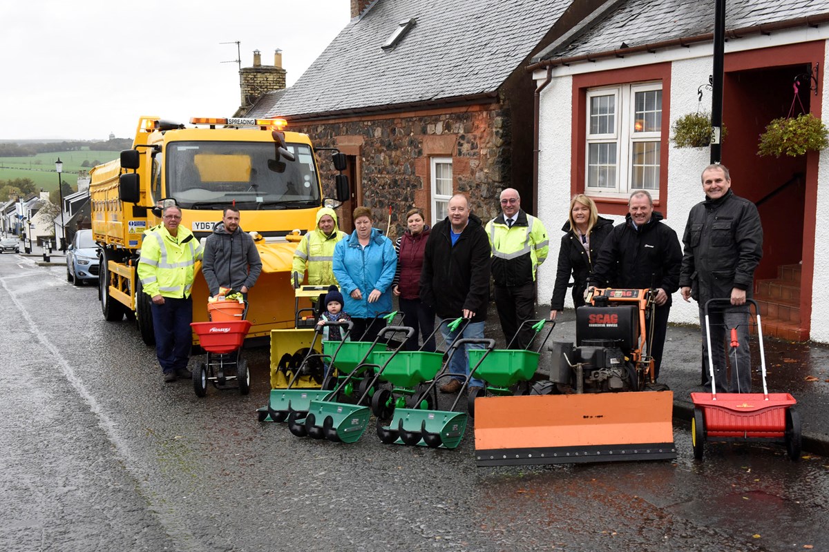 Cllr McMahon with David Reid, the gritter gang and reps from Outdoor Services and the Ayrshire Roads Alliance