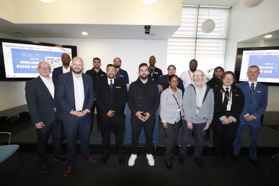 Cllr Mete Coban and Mayor Philip Glanville with council officers, including newly insourced parking officers