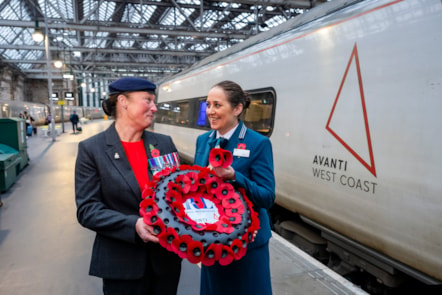 (Left to right): Vicky Lawson (Royal British Legion Poppy Appeal Manager for East Cheshire) and Anne Tweedie (Avanti West Coast Customer Service Assistant, who served as a WREN in the Royal Navy) with the poppy wreath at the start of its journey from Glasgow