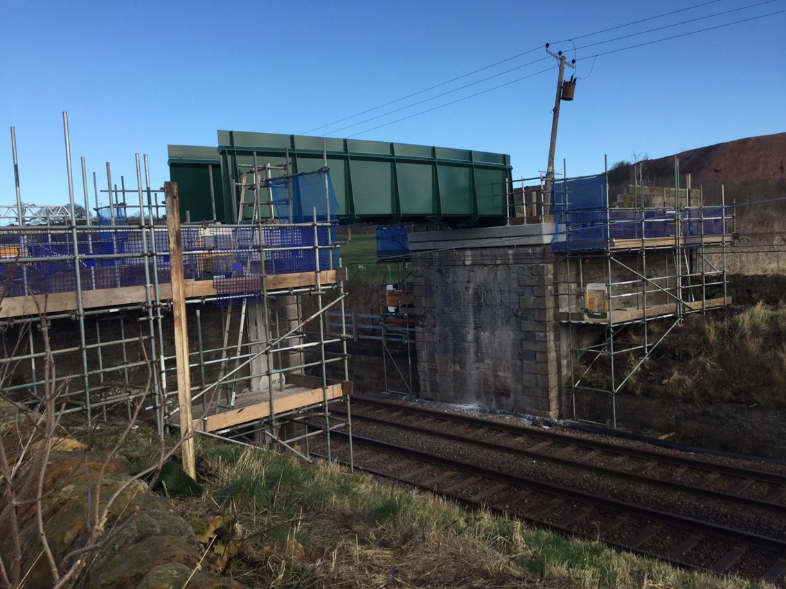 Niddry Castle footbridge in position above overhead wires on the main Edinburgh - Glasgow line: Niddry Castle is the 60th and final bridge on the E&G to be route cleared ahead of electrification of the line