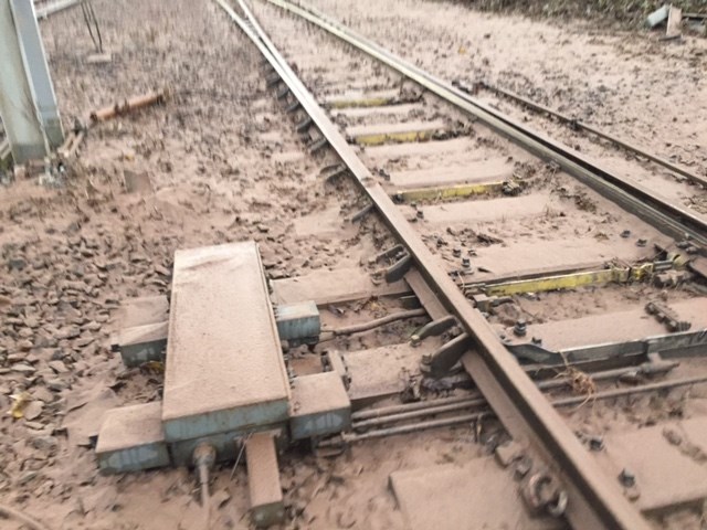 Mud covered and damaged track north of Carlisle