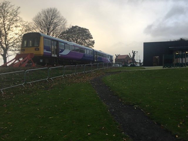 Two train carriages on site