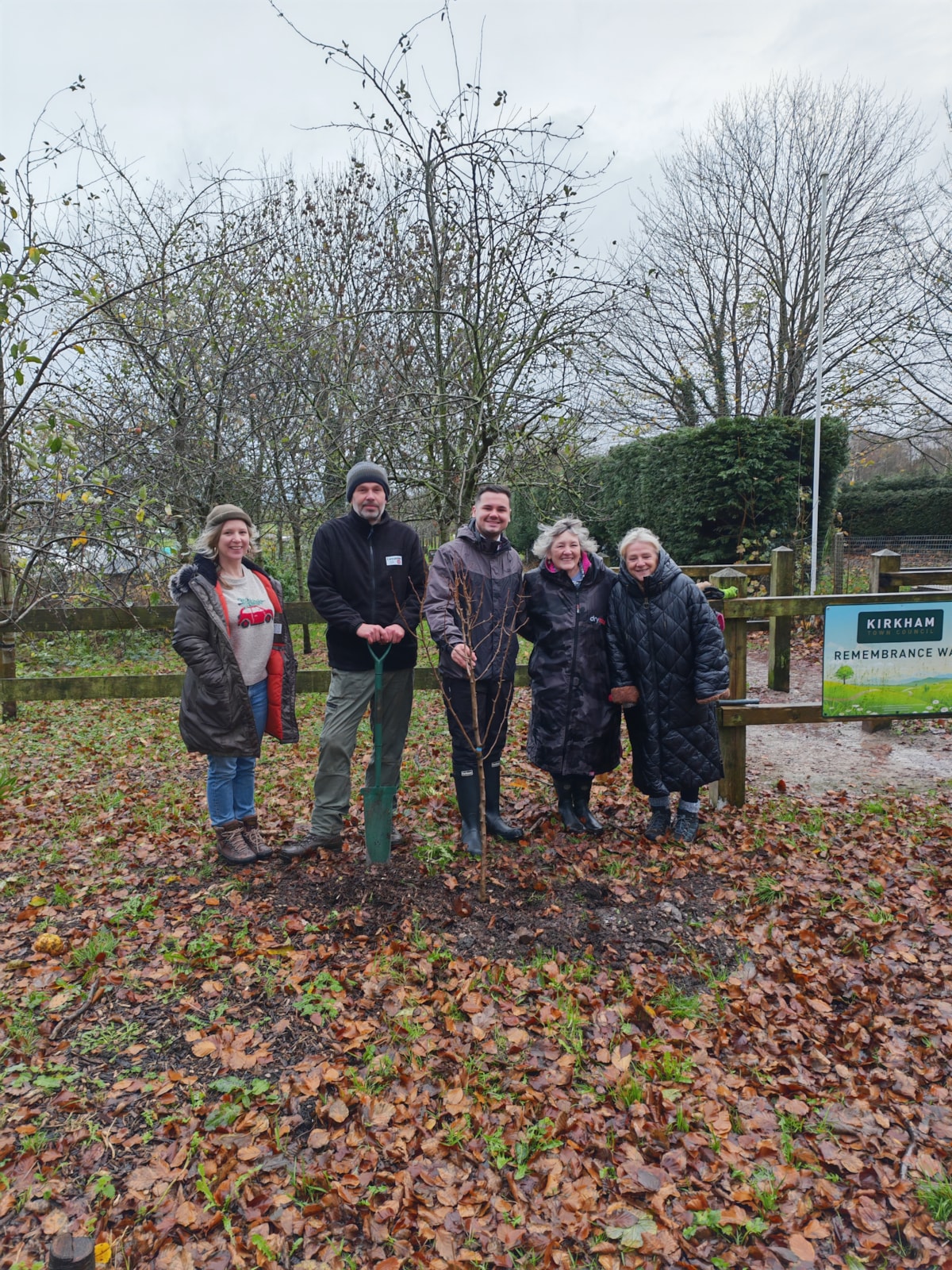 Councillor Joshua Roberts, Lancashire County Council's cabinet member for Rural Affairs, Environment and Communities, Ian Wright from the Lancashire County Council's Treescapes team and Kirkham Town Council’s Clerk Liz Squires, Cllr Maggie Ledger LPAOS and Kirsty Reader, Admin Support Officer, for the first planting session of the season on Remembrance Way