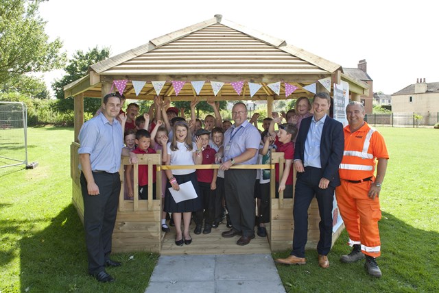 Selby winning poster 3: Students from Barlby Bridge Community Primary School greet their new gazebo with much excitement as their vision of an outdoor classroom comes to life. Within just a couple of weeks of starting refurbishments works on the nearby Selby Swing Bridge, the Network Rail project team has helped realise a long anticipated dream for this vital community resource.