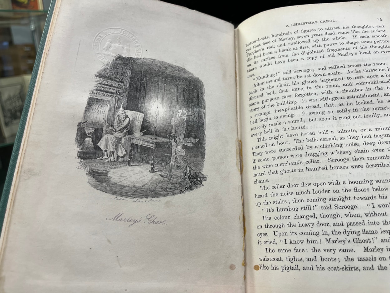 Library Christmas books: A 19th Century edition of A Christmas Carol on display.
Dickens’ first run of 6,000 copies of A Christmas Carol sold out by Christmas Eve of 1843, with publishers returning to the press another eight times within the first six months of publication to meet demand.