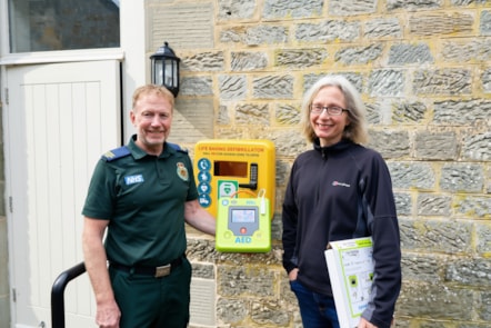 Paul Brolly and Beck Orton with new defib