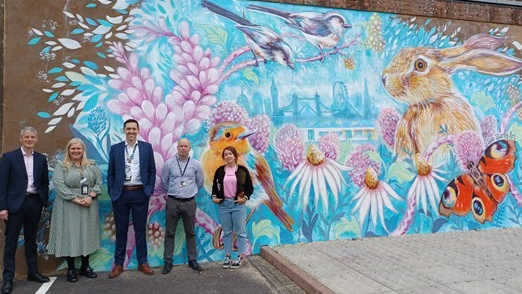 South Western Railway and Network Rail team up with Basingstoke artist Sian Storey to paint new and vibrant station mural: Basingstoke art mural