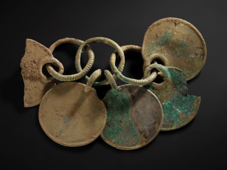 07. A bronze rattle pendant from the Peebles Hoard. Image © National Museums Scotland