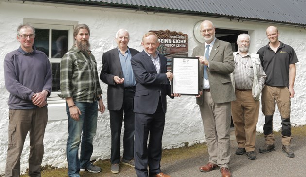 SNH Chair receives Biosphere certificate: From left to right: Peter Cunningham, Donald MacIver, George Hendry, Mike Cantlay (SNH Chairman), Iain Turnbull, Tom Forrest, Doug Bartholomew (SNH). All Wester Ross Biosphere Board members (except the SNH staff).