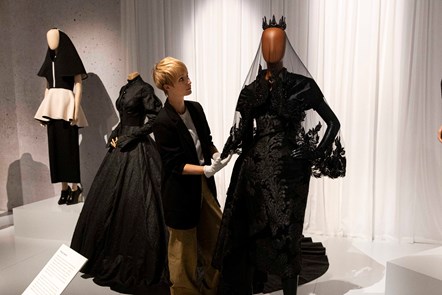 Curator Georgina Ripley, puts the finishing touches to Beyond the Little Black Dress at the National Museum of Scotland.