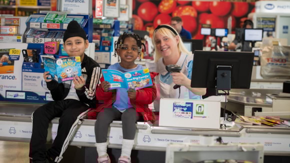 Manchester celebrates World Book Day with author events for schools and free books given out to supermarket shoppers: JPL 4585