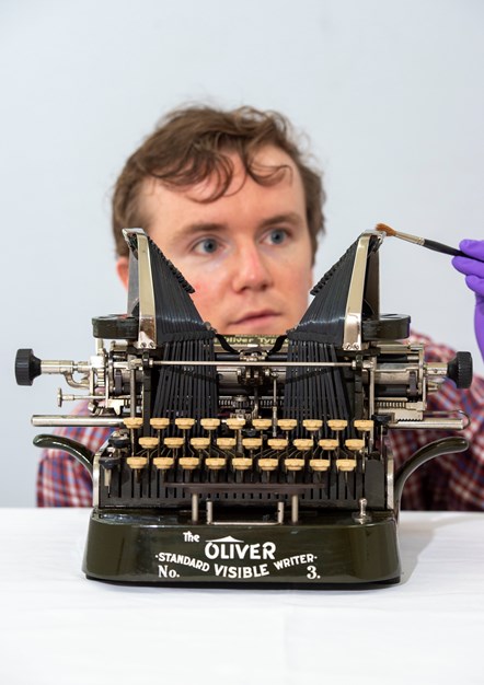 PhD student James Inglis takes a closer look at an Oliver Standard Visible Writer No. 3. Photo © Neil Hanna (3)