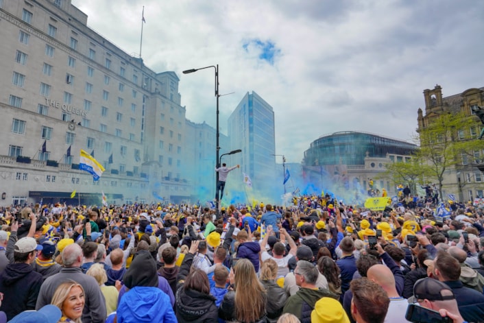 parade 9: Fans in a packed City Square await the arrival of Leeds United's promotion parade.