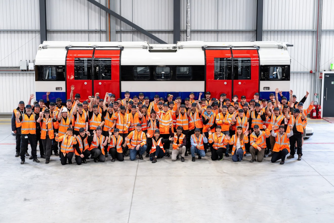 Image 2 - Team Infront of Piccadilly Train