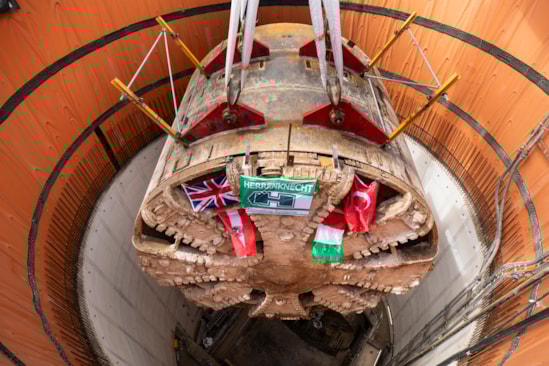 TBM Caroline lifted out of vent shaft at Green Park Way, Greenford - May 2025-5: HS2 lifts Tunnel Boring Machine (TBM) ‘Caroline’ from below ground at the Green Park Way site in Greenford, West London.

On Sunday 25th May, engineers working on the HS2 project lifted the TBM 9.48metre diameter cutterhead, front and middle shield, weighing 850 tonnes, using a large gantry crane. The tunnelling machine concluded its 5mile journey from West Ruislip in April, arriving in an underground reception chamber. TBM Caroline excavated over 1.2 million tonnes of earth and installed 4,217 tunnel rings.
