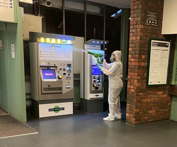 Sanitiser being used at a Southern railway station: Credit: Govia Thameslink Railway