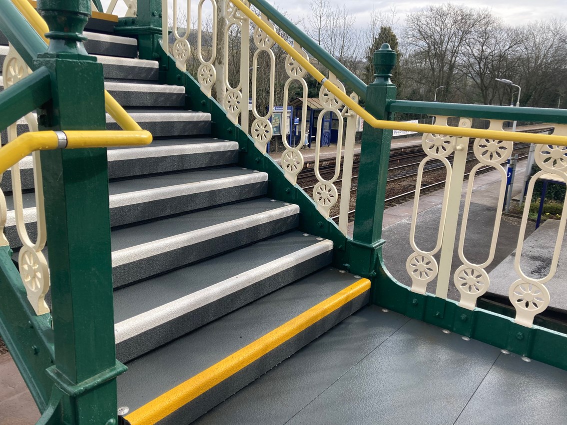 Close of up new stairs and floor grip on Furness Vale station footbridge
