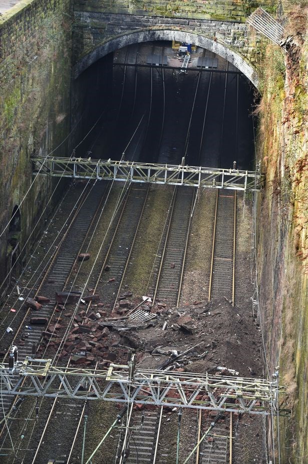 No trains to run in or out of Liverpool Lime Street for several days following wall collapse: Aerial view of the collapsed wall at Liverpool Lime Street