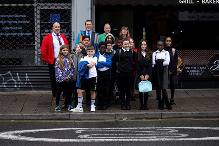 Deputy Minister for Climate Change with responsibility for Transport, Lee Waters with children and teachers from Roath