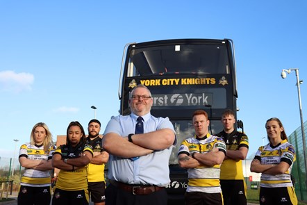 First York driver and Knights fan Pete Richardson with players and the electric bus branded in the club colours