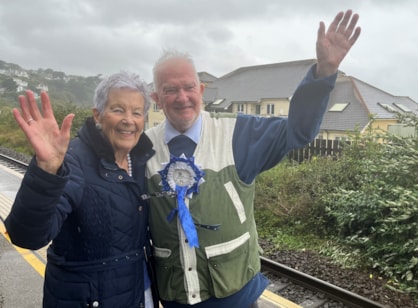 George and Margaret wave