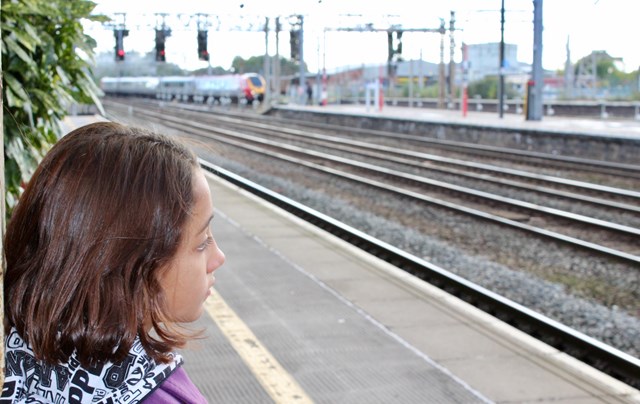 Railway Children Sleepout: Vulnerable girl (model) on platform at station