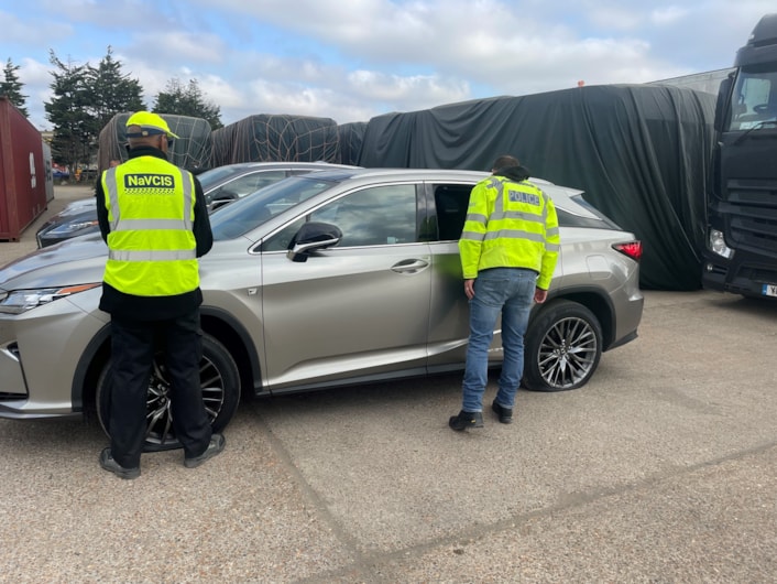 NaVCIS officers inspecting recovered vehicles at Felixstowe: NaVCIS officers inspecting recovered vehicles at Felixstowe