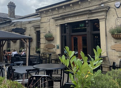 This image shows the ticket office pub at Ilkley landscape