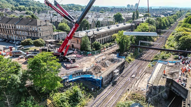 Construction of the new bridge begins in the southside of Glasgow.: Aerial cil lift at Nithsdale road