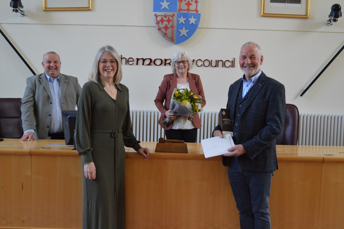 L-R: Mike Rollo, Denise Whitworth, Moira Duncan and Willie Duncan mark Willie's 50 year service with Moray Council.