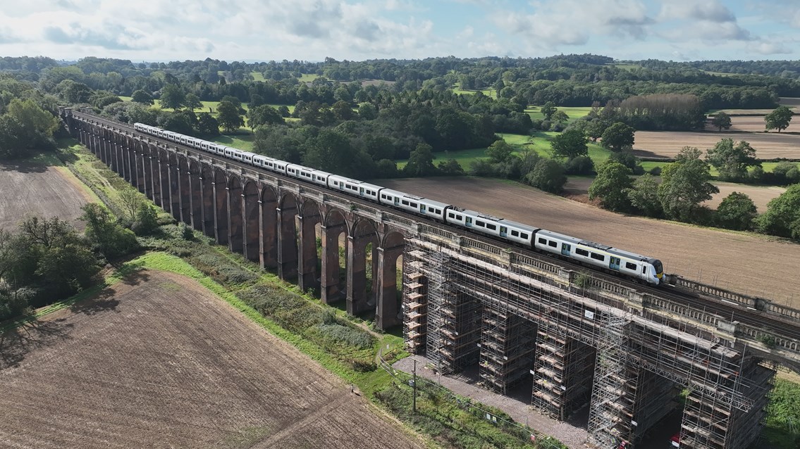 A GTR Thameslink train travels over Ouse Valley Viaduct Oct 23