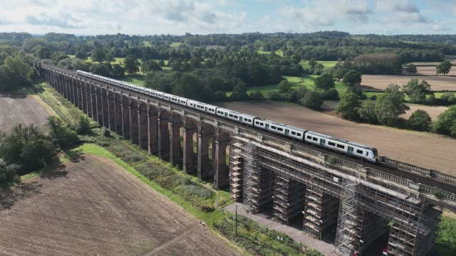 A GTR Thameslink train travels over Ouse Valley Viaduct Oct 23