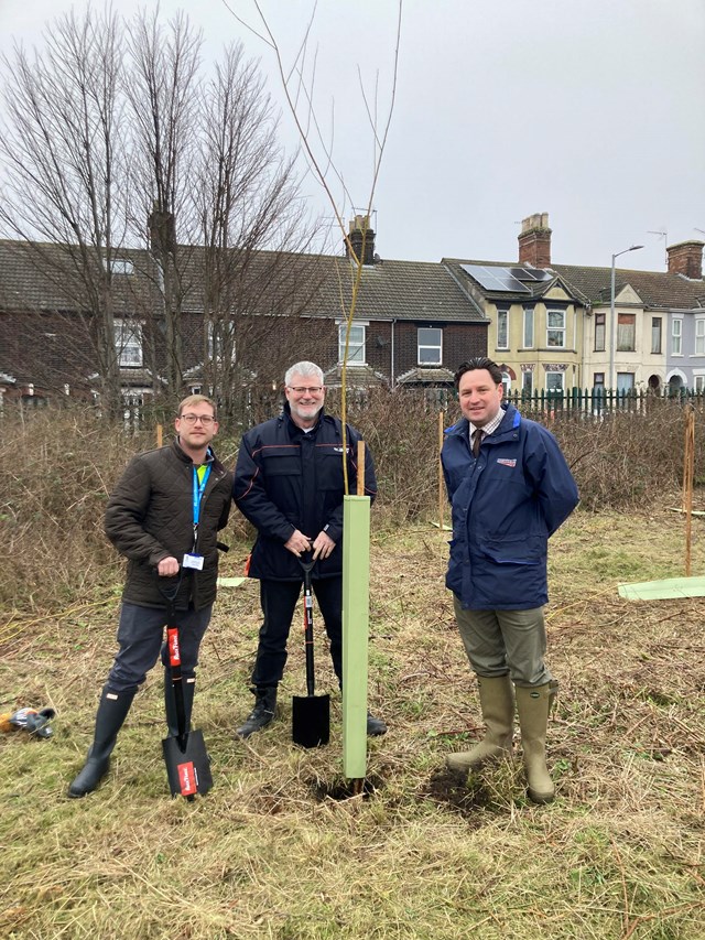 Planting the willows - portrait version. Councillor Ryan Harvey (left) with Network Rail engineers Stewart Cowan (centre) and Liam Allen (right)