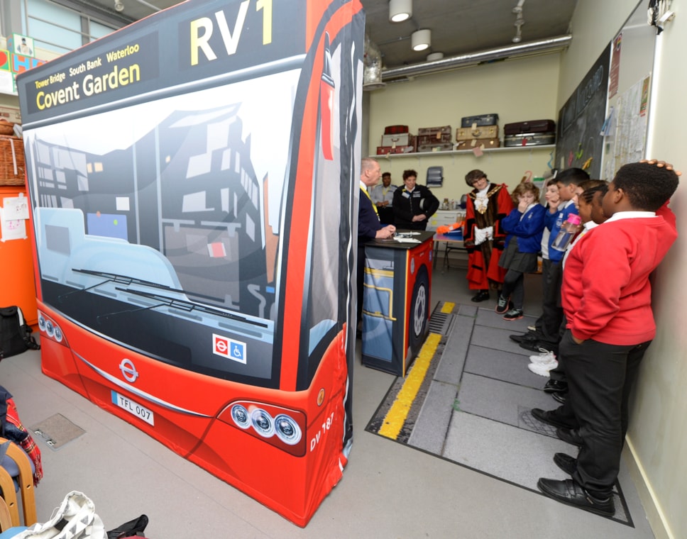 children learn about getting on the bus