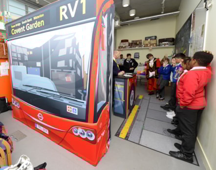 children learn about getting on the bus