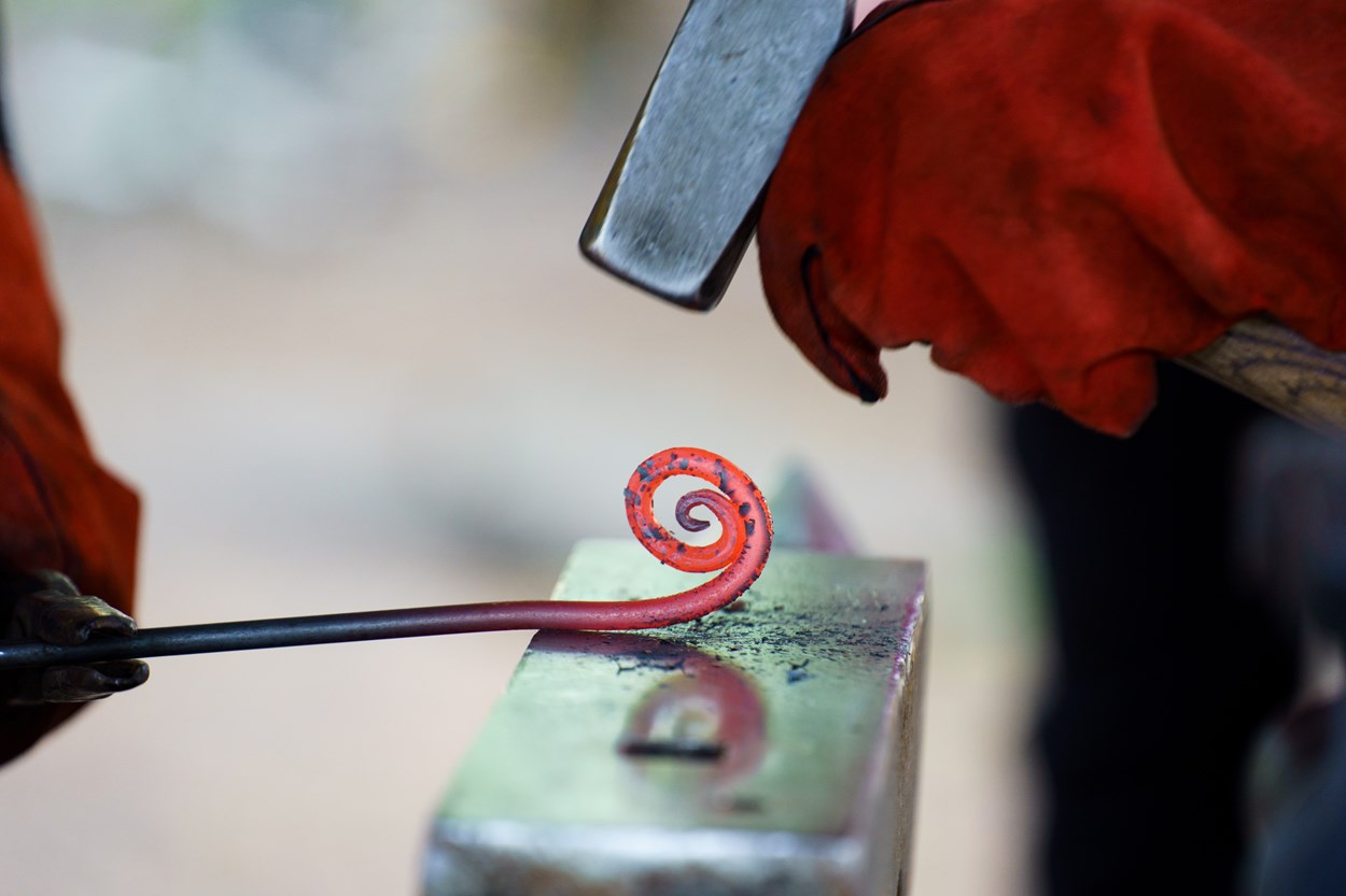 Heritage 2: A blacksmith skills demonstration at a previous New Briggate High Street Heritage Action Zone event held at St John's Church in Leeds.