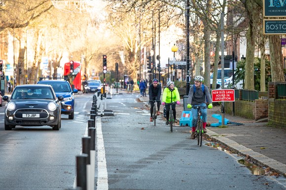 TfL Image - People cycling on the Cycleway 9 on Chiswick High Street.