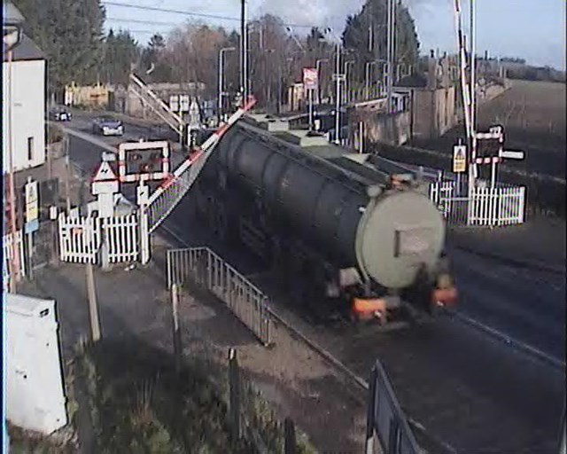 Tanker driver runs the risk at Foxton crossing, Cambs (3): Tanker driver runs the risk at Foxton crossing, Cambs (3)