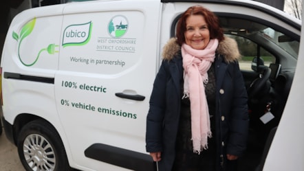 Cllr Arciszewska with EV vans 