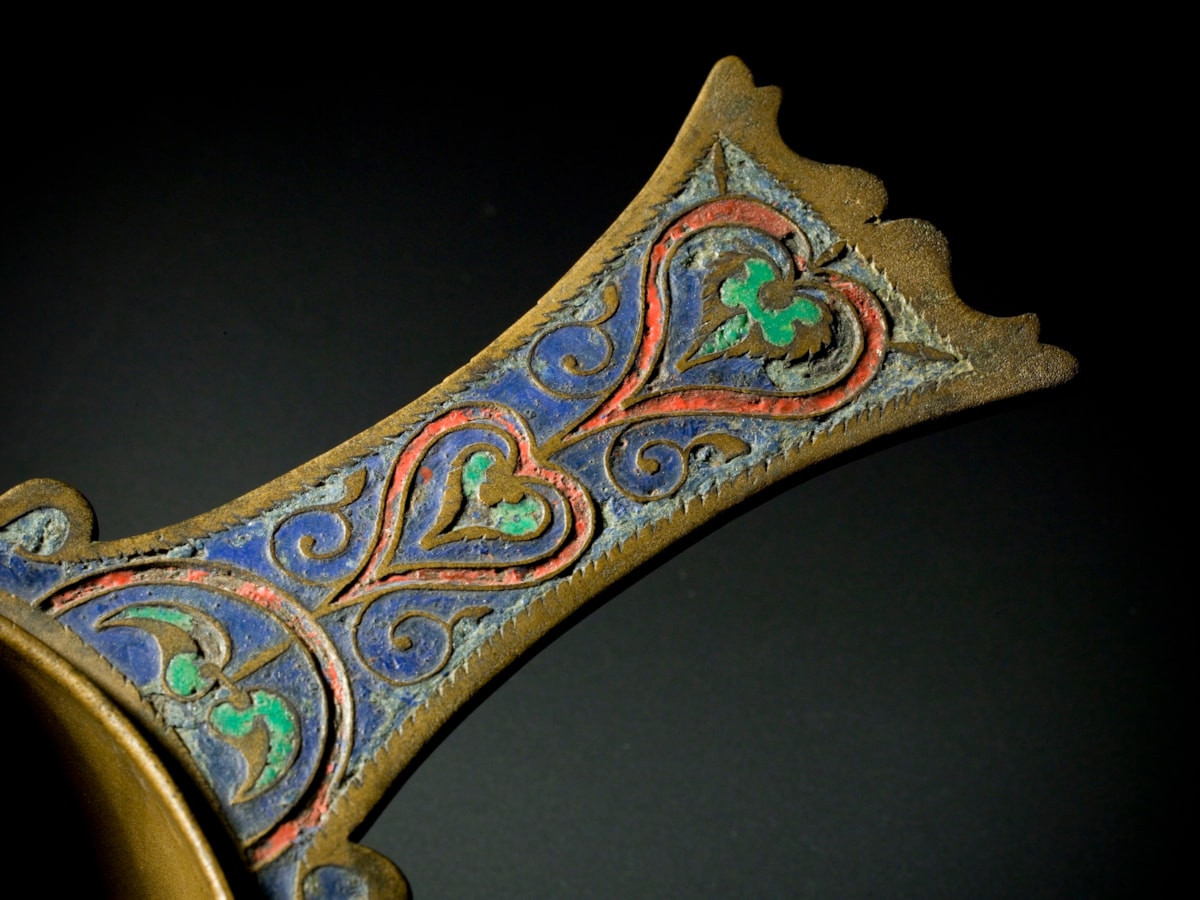 Leaded bronze skillet with enamel , Linlithgow, 1st or 2nd century AD.Image © National Museums Scotland (1)