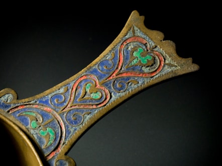 Leaded bronze skillet with enamel , Linlithgow, 1st or 2nd century AD.Image © National Museums Scotland (1)