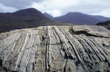 Layered gabbros and peridotites on the western slopes of the Rum Cuillin. ©Lorne Gill/NatureScot: Layered gabbros and peridotites on the western slopes of the Rum Cuillin. ©Lorne Gill/NatureScot