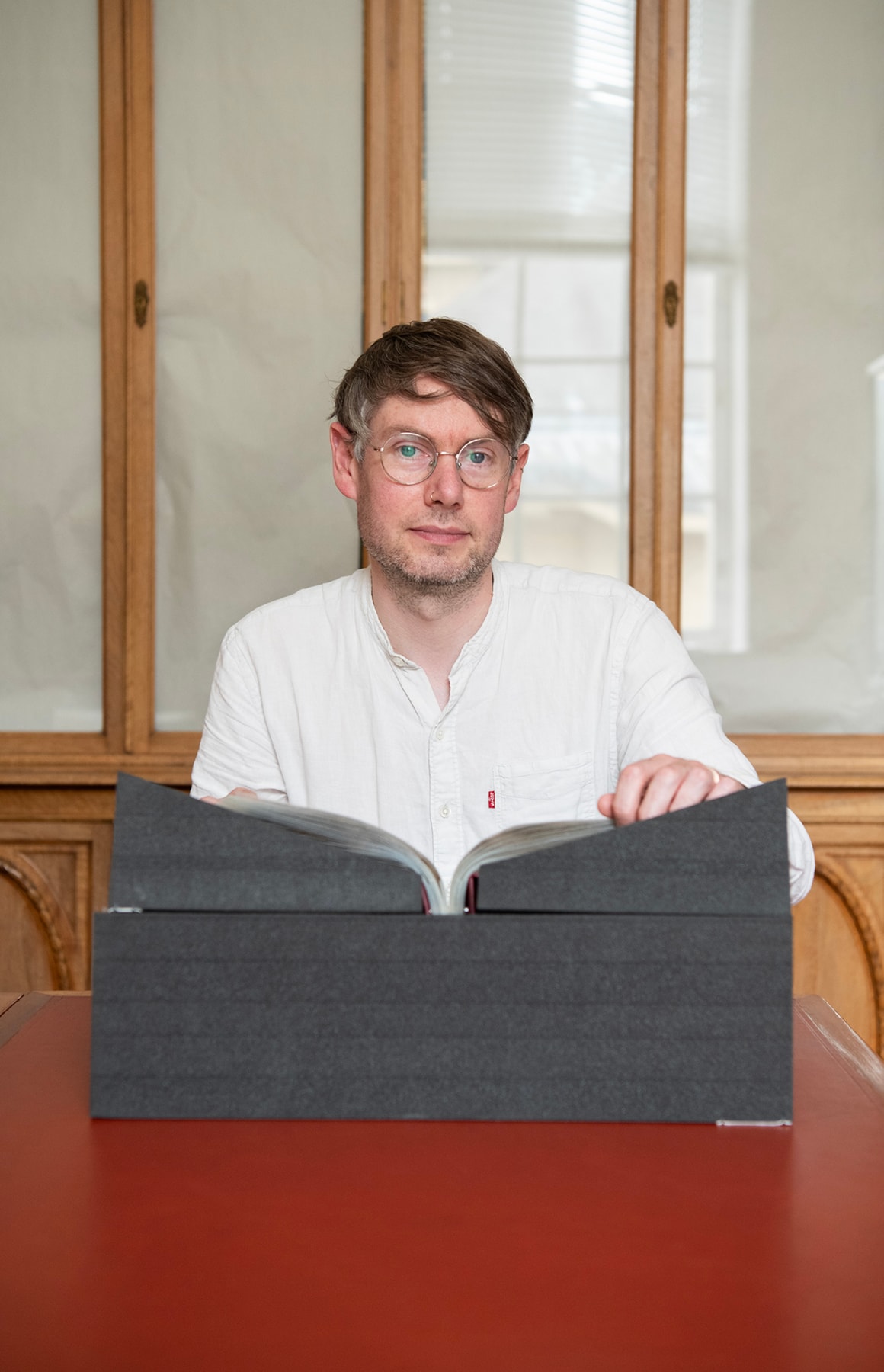 Chris Cassels, Head of Archives at Manuscripts at the National Library of Scotland, with the Book of the Dean of Lismore