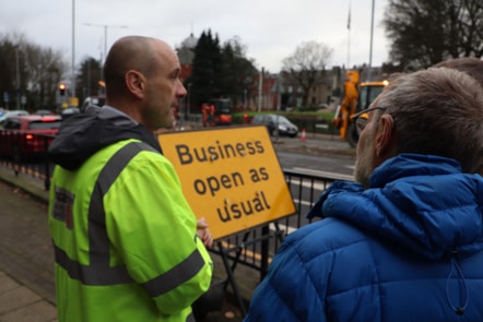 Councillor Harris talks to one of the highways team