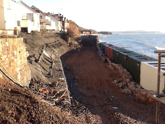 Media Update: Engineers on site across South to keep trains moving - where possible: The latest view of Dawlish, with the breakwater made from shipping containers