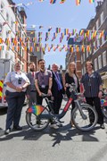 TfL Image - Pride 2018 Copyright Transport for London: Members of TfL's LGBT+ Staff Network Group OUTbound along with 
- Susan Allen: Head of Customer Interactions & Embrace Network Executive Sponsor, Santander
- Stuart Laird: Head of Pride Events, Santander
- Darren Kerrison: Embrace Network Co-Chair, Santander