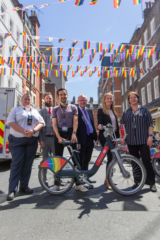 TfL Image - Pride 2018 Copyright Transport for London: Members of TfL's LGBT+ Staff Network Group OUTbound along with 
- Susan Allen: Head of Customer Interactions & Embrace Network Executive Sponsor, Santander
- Stuart Laird: Head of Pride Events, Santander
- Darren Kerrison: Embrace Network Co-Chair, Santander